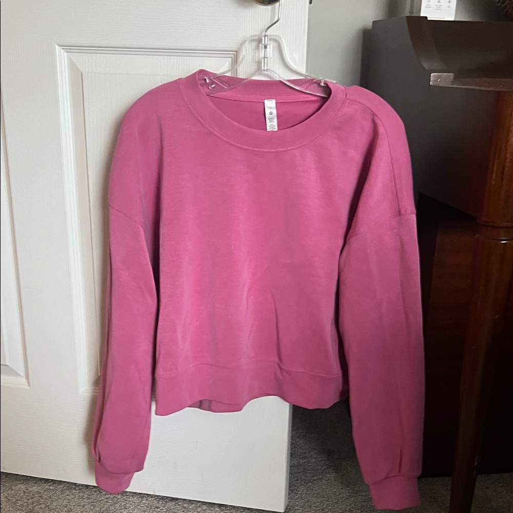 Pink Crewneck Soft Stream Lululemon size 10 Sweatshirt.  Like new condition.